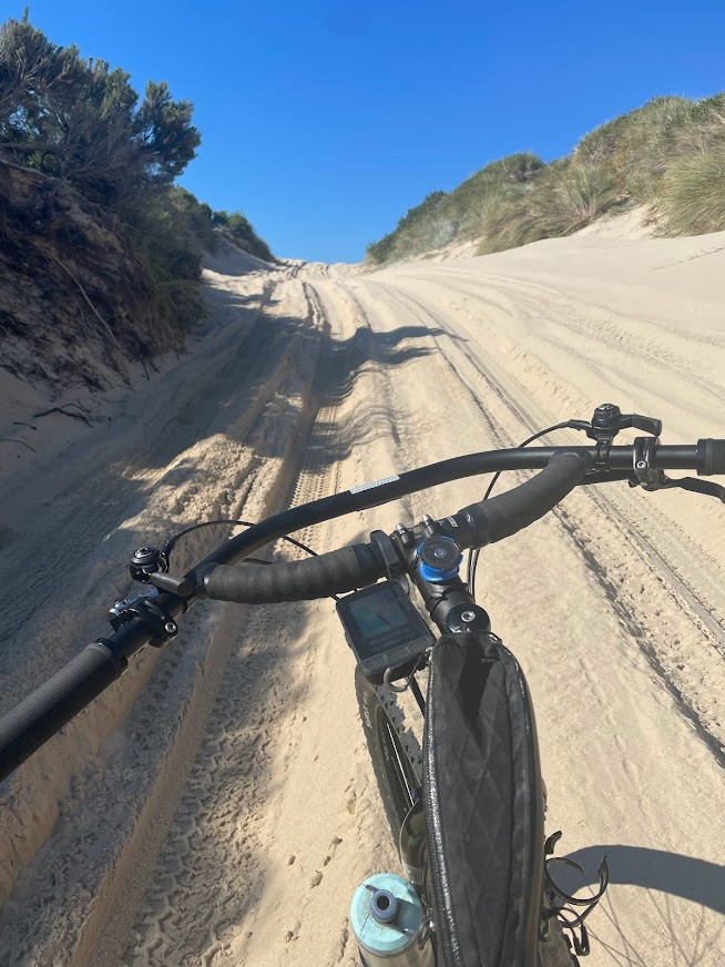 Pushing bike off the beach